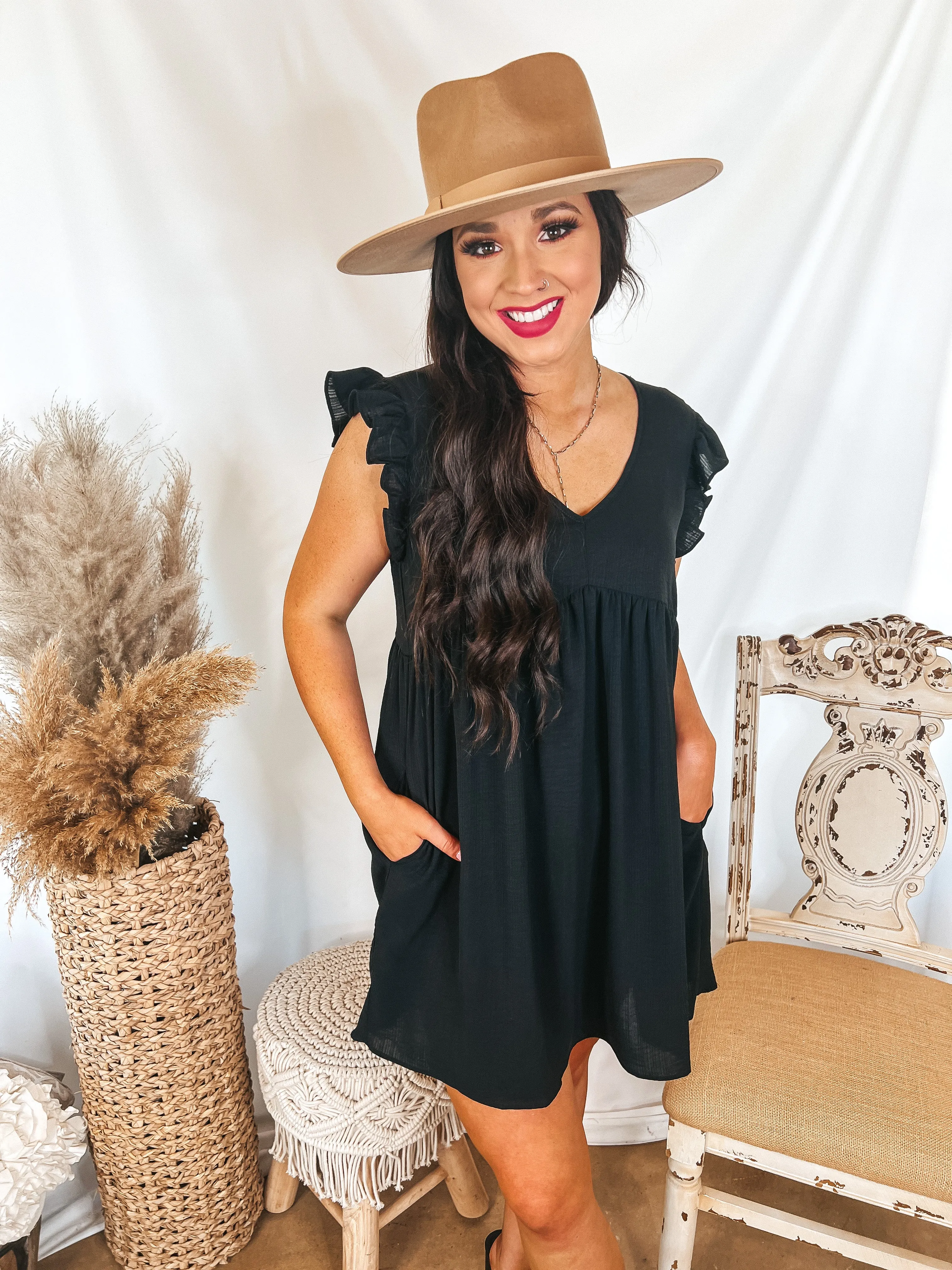 Last Chance Size Small | Capture Your Attention V Neck Dress with Ruffle Cap Sleeves in Black