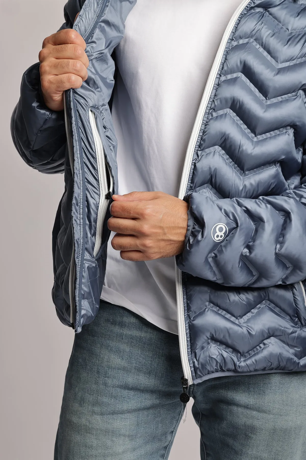 Men's packable puffer jacket in metallic cobalt