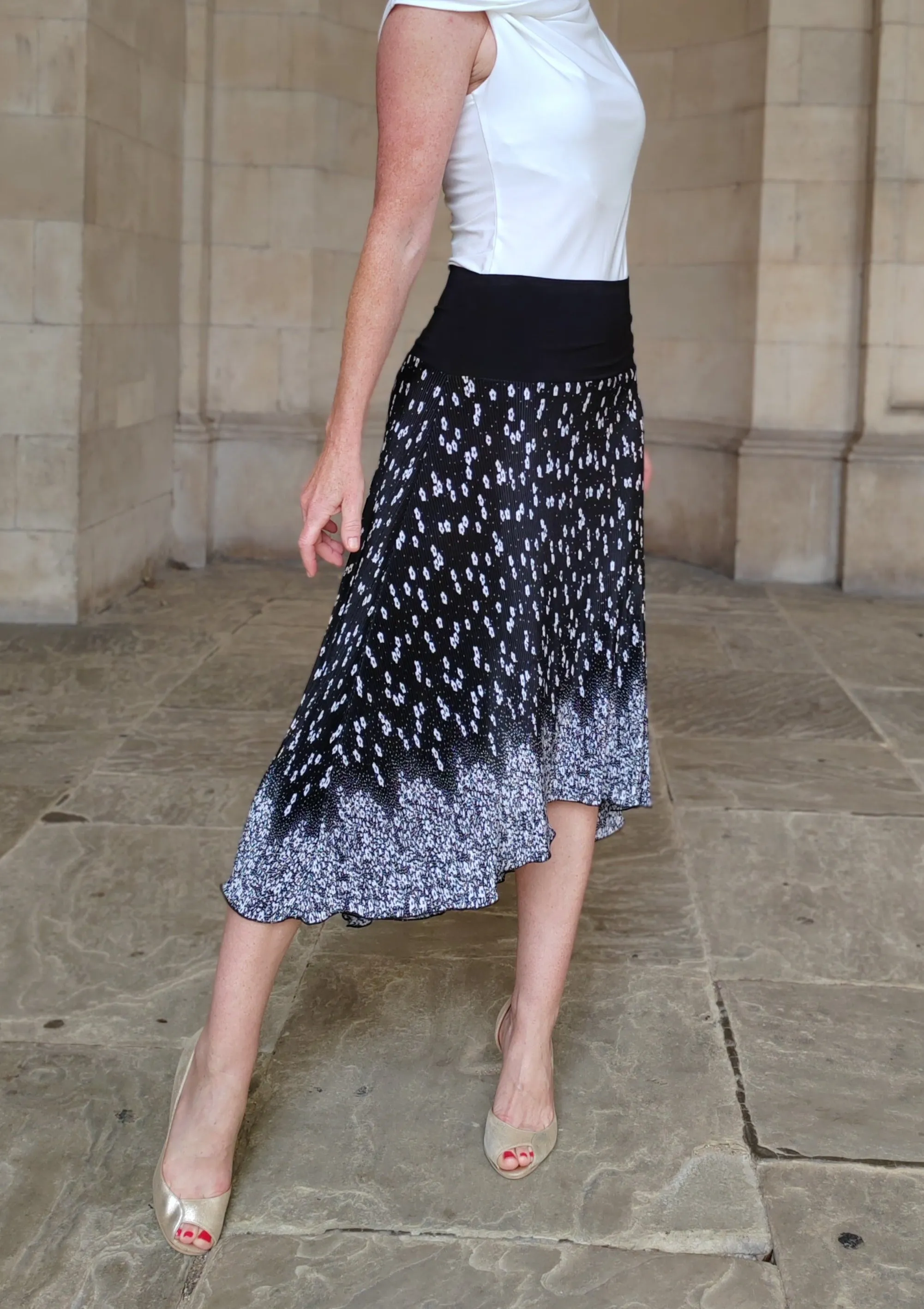 PLEATED SKIRT with decorative Border Print